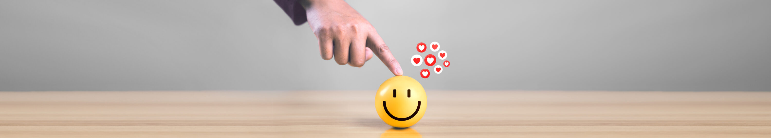 Hand,With,Happy,Smiley,Face,Emotion,On,Wooden,Circle.,Customer